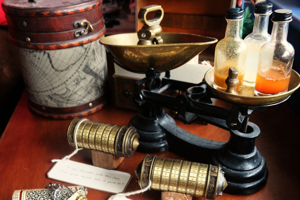 Wooden boxes, metal code boxes, scales with bottles